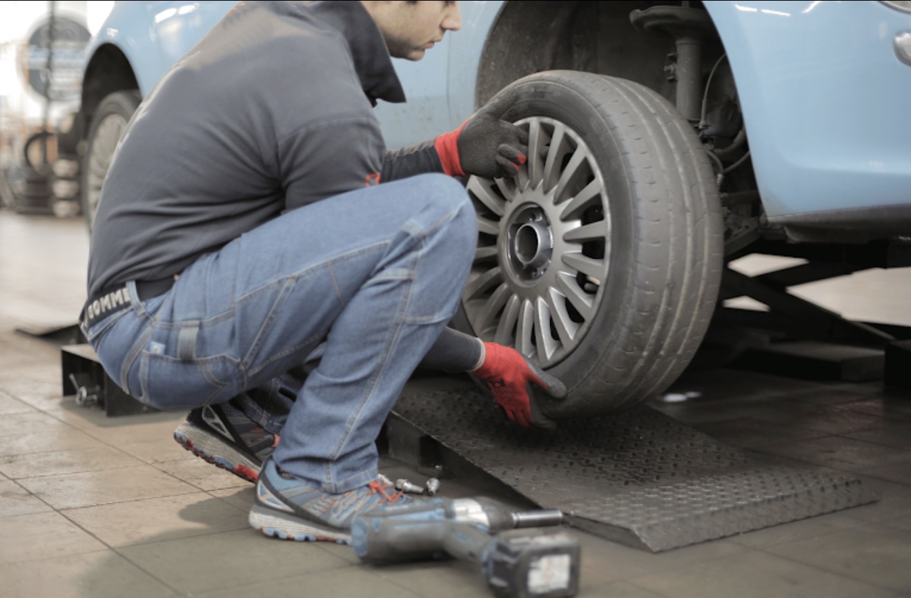 Technician working on a wheel